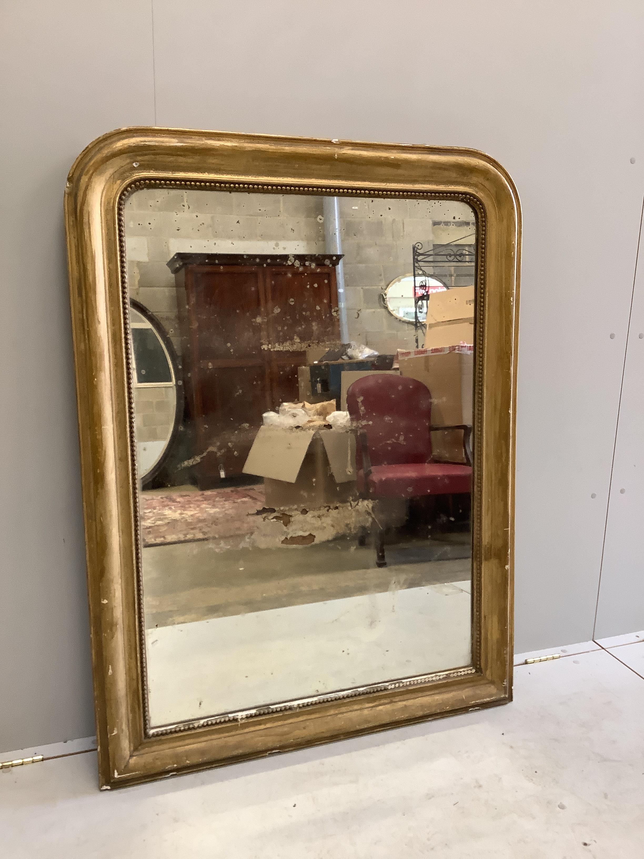 A 19th century Louis Philippe carved giltwood and composition wall mirror, width 100cm, height 134cm